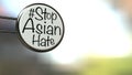 English texts Ã¢â¬ÅStop Asian HateÃ¢â¬Â on label in front of shop, concept for calling international community to stop hurting and